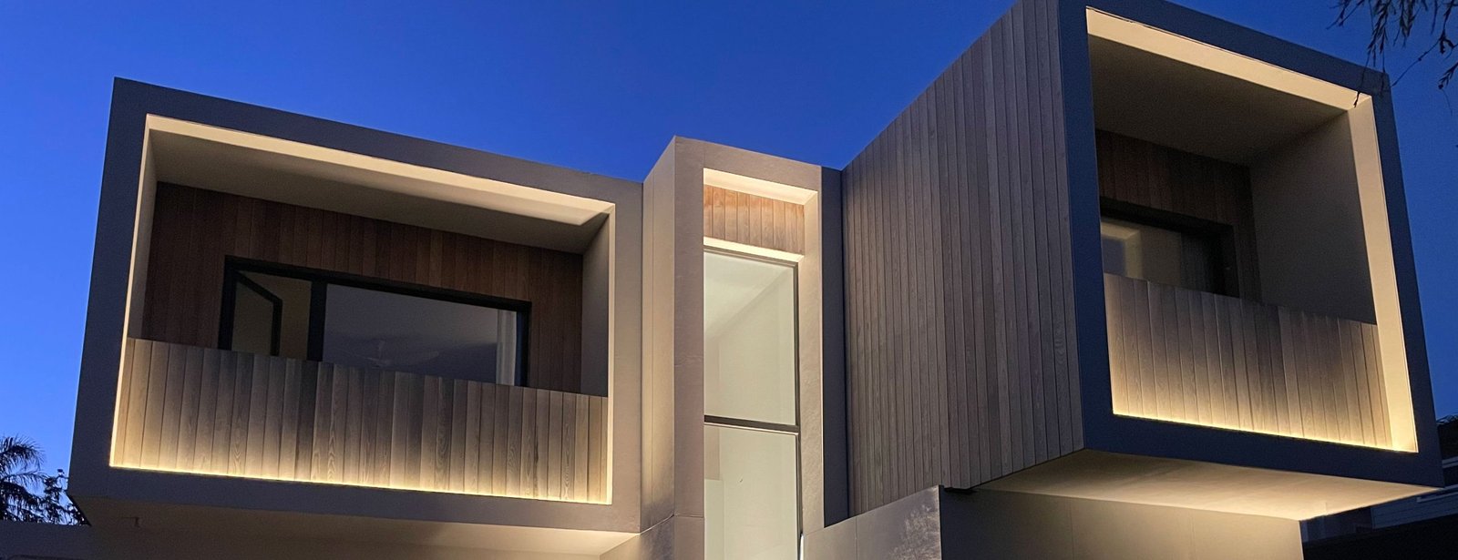 IMG_9424---Copy Night view showing lit front of Collaroy house